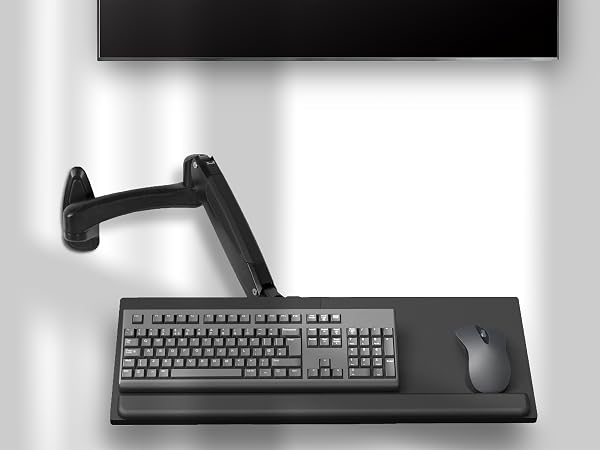 Keyboard tray mounted to wall