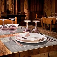 a table with a place setting and glasses on it