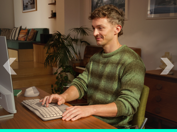 a person sitting on a computer