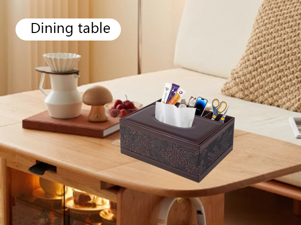Text reads: 'Dining table'. Wooden table surface with white ceramic pitcher and dark gray storage box containing various items.