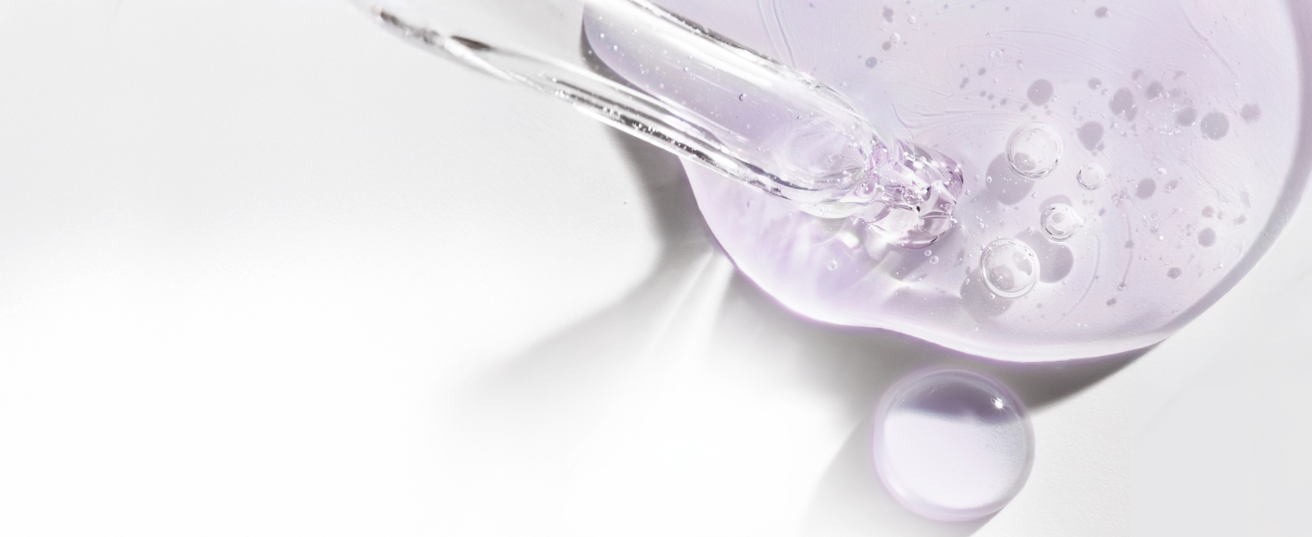 Closeup of dropper & serum particle next to information related to Biotin and its benefits.