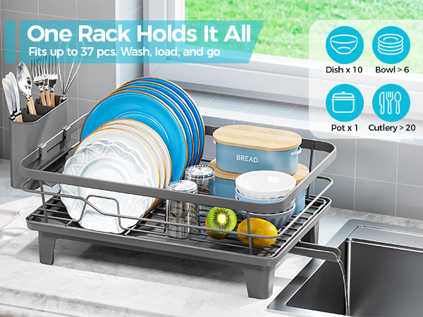 Text reads "One Rack Holds It All" and "Fits up to 27 lbs. Wash, load, and go." Dish drying rack in kitchen sink with plates, bowls, utensils, and yellow measuring tools. Icons show storage capacity for 10 dish sets and 20 utensils.