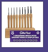 Text reads 'Quilted Bear' 'CROCHET HOOKS & DISPLAY BOX' '9 ERGONOMIC BEECH WOOD'. Set of nine wooden crochet hooks displayed in ascending size order on wooden stand.