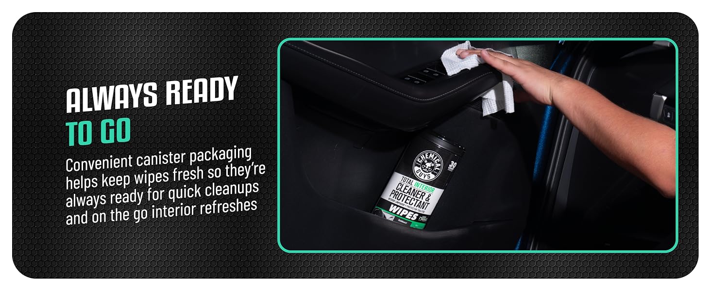 Interior cleaning wipes removing dirt from vinyl, leather, fabric, and glass surfaces inside vehicle