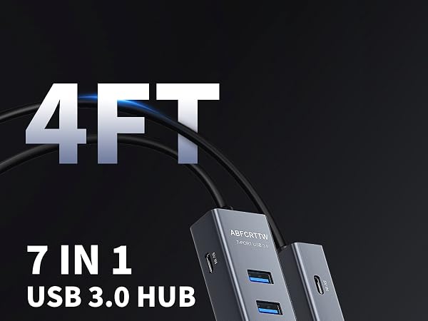 USB 3.0 hub with 7 ports, including two visible USB-A ports and one USB-C port. Device is compact, rectangular, and dark-colored with '4FT' text prominently displayed.