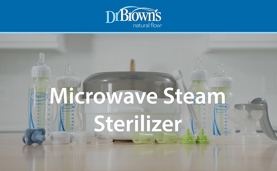 Microwave steam sterilizer on the counter with baby bottels and accessories