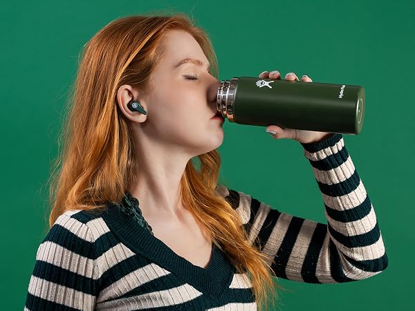 Drinking out of waterbottle wearing go pods