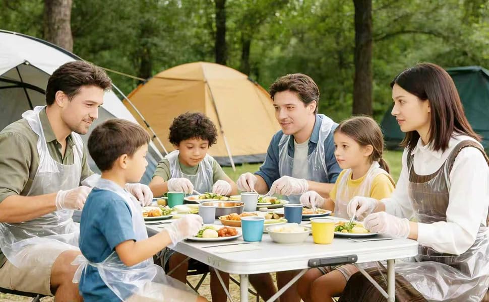 Wearing disposable aprons and gloves while camping and dining