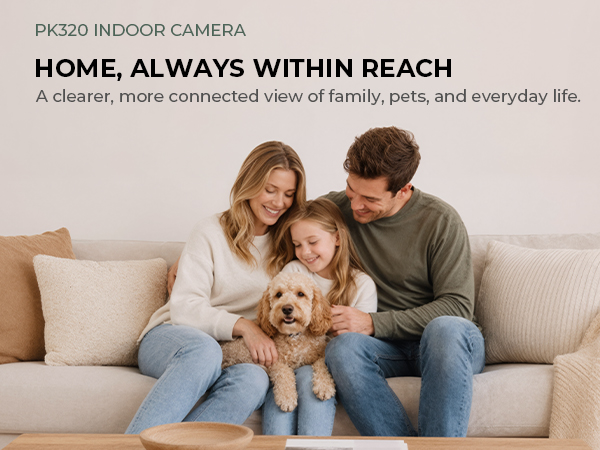 White indoor camera on a coffee table as a family relaxes together in a living room.