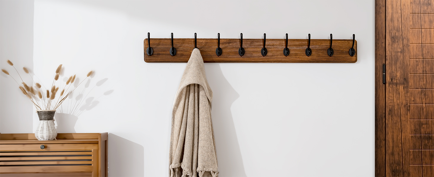 SKOLOO LONG WALL MOUNTE COAT RACK ON THE ENTRYWAY