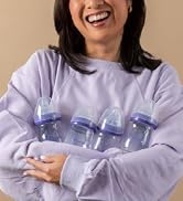 Woman Holding Lansinoh Baby Bottles