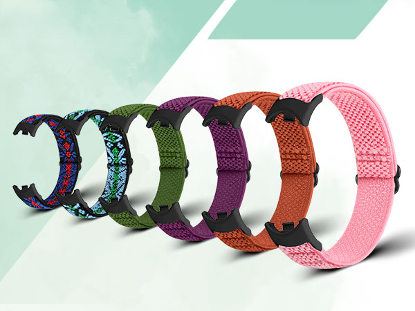 Six colorful woven fabric watch bands arranged in a row, showcasing various patterns and hues including navy, teal, green, purple, orange, and pink.