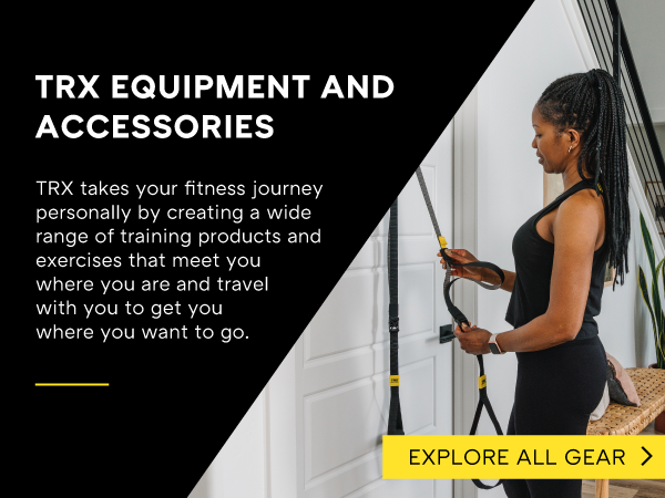 A person using a door anchor to set up their Suspension Trainer. Text reads: Explore accessories.