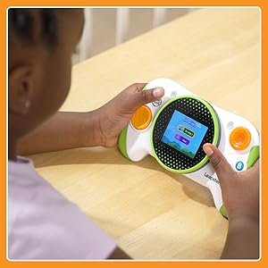 Kid saves her progress as she plays her game.