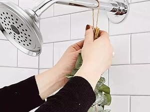 behind the showerhead