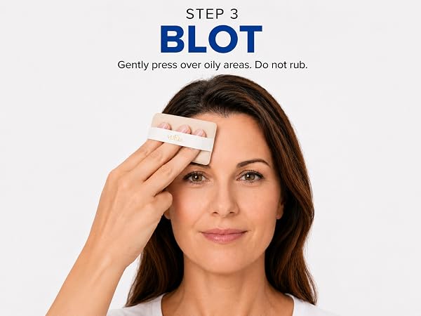 Makeup-friendly oil blotting film pressed on oily face area with puff