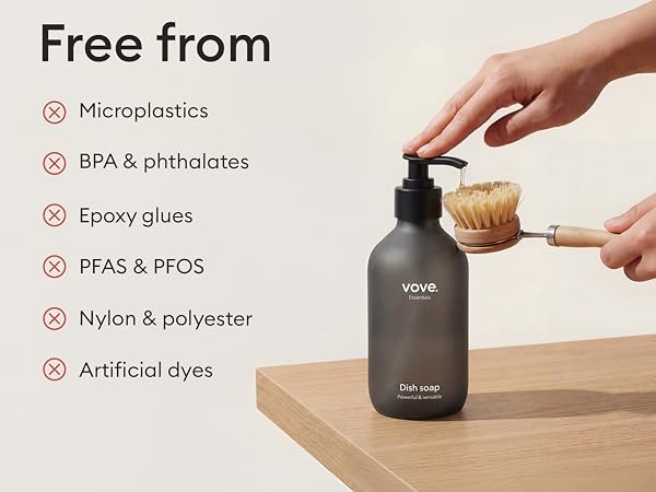 Close-up shots of hands pouring or dispensing liquid from dark bottle, appearing to demonstrate product usage on wooden or natural surface.