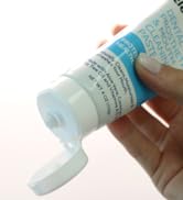 hand holding product tube