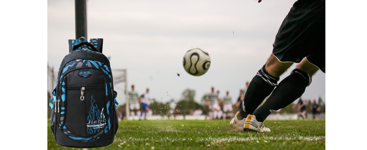 a soccer ball is in the air as a person watches.