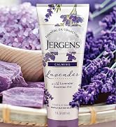 Bottle of Jergens Lavender Body Butter in front of lavender plant