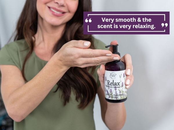 Woman using Relax Massage Oil.