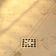 DrainWig laying flat installed in drain