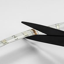Smart tape light being cut with scissors