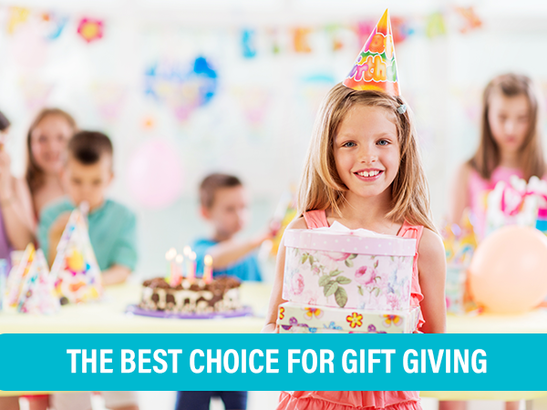 a little girl in a birthday party with a birthday hat.