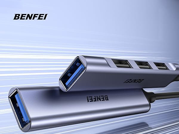 Product showcase of metallic gray USB hub or adapter with multiple ports, shown from various angles in professional lighting against light background.
