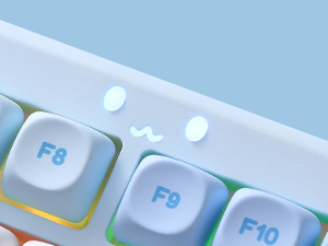 Close-up of keyboard function keys (F8, F9) against light blue background, focusing on specific key layout and design details.