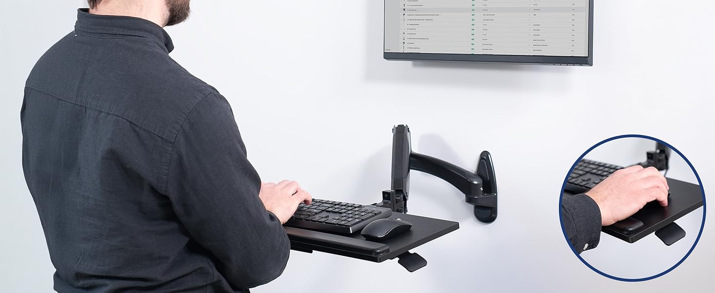 man typing on keyboard