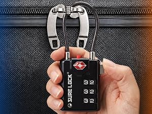 Visible red dot indicator shows the luggage lock has been opened for inspection