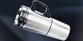 Cylindrical metallic flashlight or torch device with handle, photographed against dark background showing reflective metallic surface.