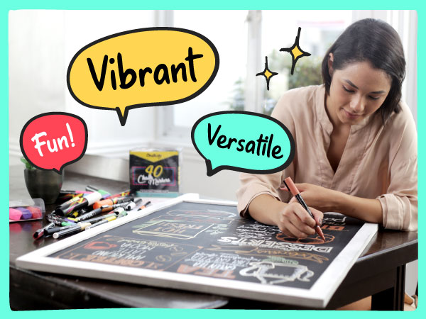 Woman using vibrant, versatile, and fun Chalkola chalk markers on a chalkboard