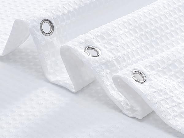 white cloth shower curtain