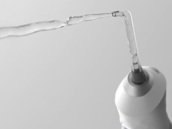 water flosser spraying