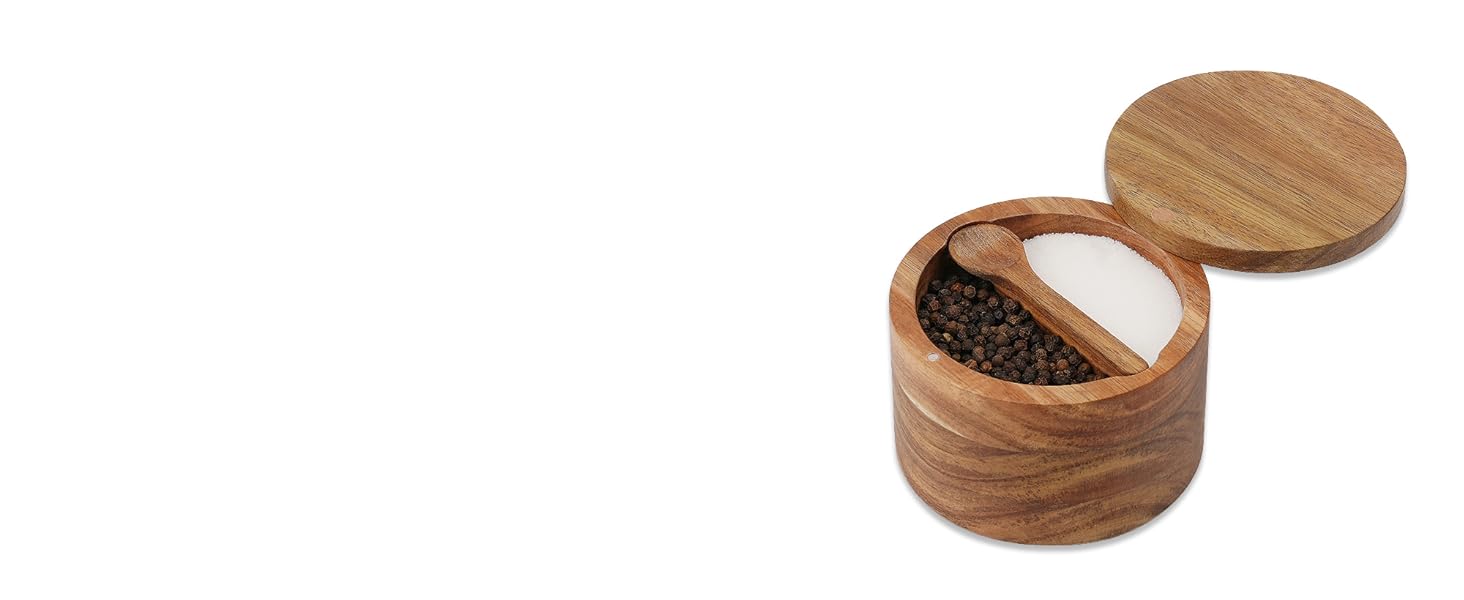 Round wooden container with hinged lid, open to reveal two compartments. One side contains dark-colored contents, likely spices or seasoning.