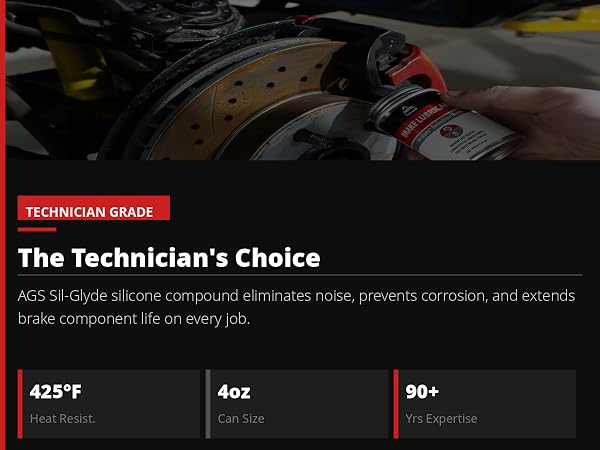 Mechanic applying AGS Brake Lubricant to caliper pin with 425°F, 4oz, and 90 years expertise badges
