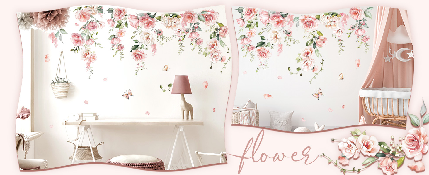 Floral wall decal featuring pink roses and green leaves. Decorative elements in a light, airy room with white furniture and 'flower' text.
