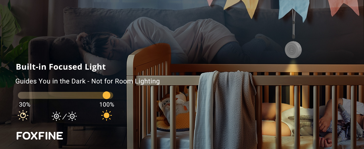 Sleeping baby in crib with soft amber focused light, showing bedtime comfort