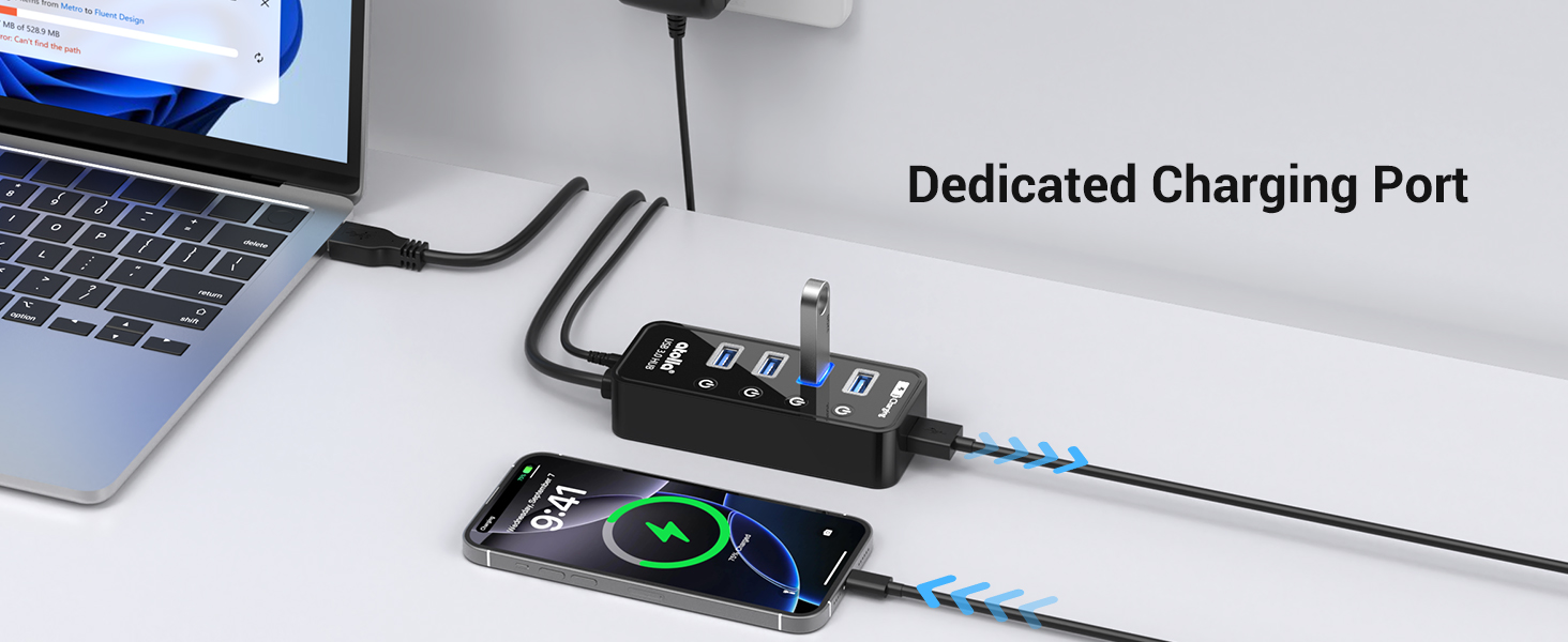 Dedicated charging port to charge your phone while using the other ports