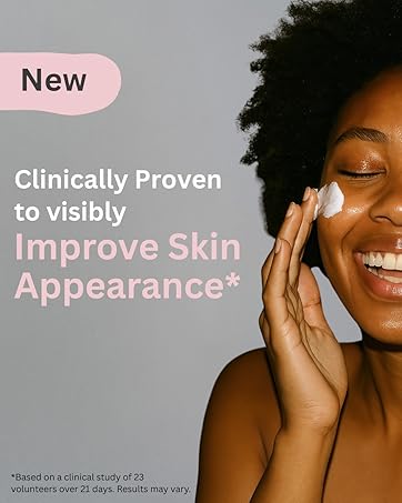 Text reads 'New' and 'Clinically Proven to visibly Improve Skin Appearance' with asterisk. Woman with dark curly hair applying skincare product to cheek.