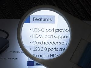 Image of magnifier magnifying fine print with LED light turned on