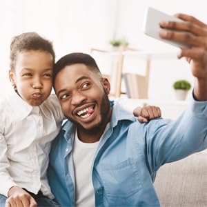 Image of family taking a photo with a phone