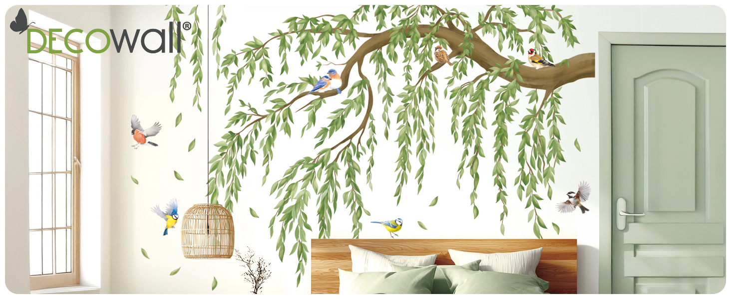 Text reads 'DECOWALL'. Interior design visualization showing a room with windows and hanging plants creating a nature-inspired aesthetic.