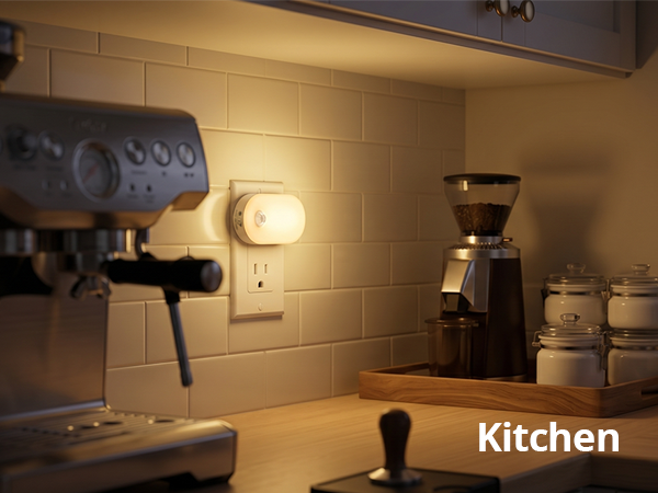 Dimmable plug-in night light illuminating a kitchen counter.