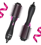 Two black hot air styling brushes with pink accents, featuring round bristled barrels. Decorative pink ribbon element in composition.