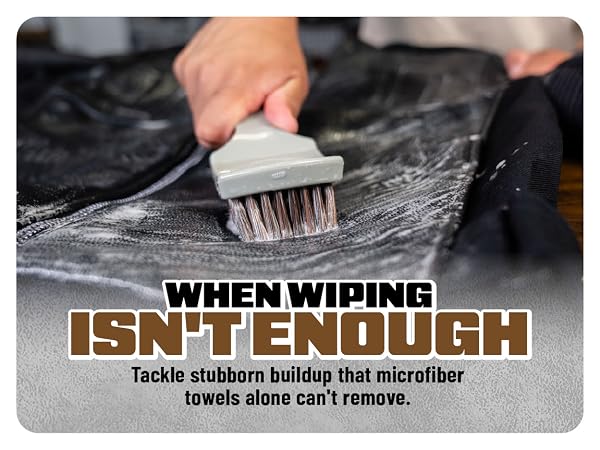 Dense bristles dig into perforations and piping while the handle keeps hands clean.