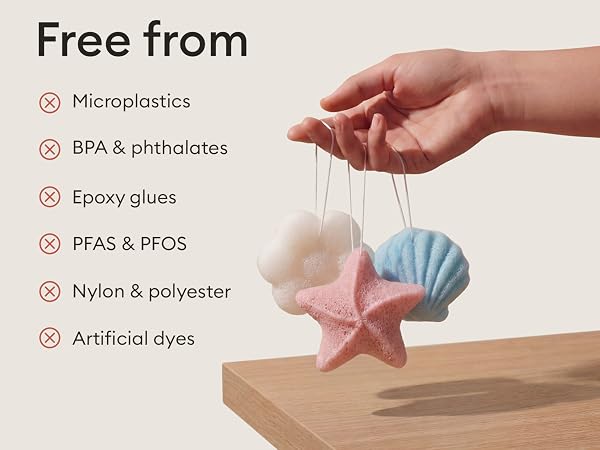 Text reads 'Free from' with crossed-out items: 'Microplastics, BPA & phthalates, PFAS & PFOS, Nylon & polyester, Epoxy glues, Artificial dyes'. Different angle of hands with blue material.