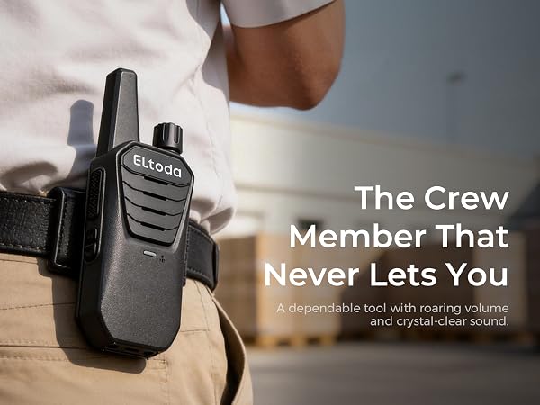The walkie talkie is clipped onto the belt.